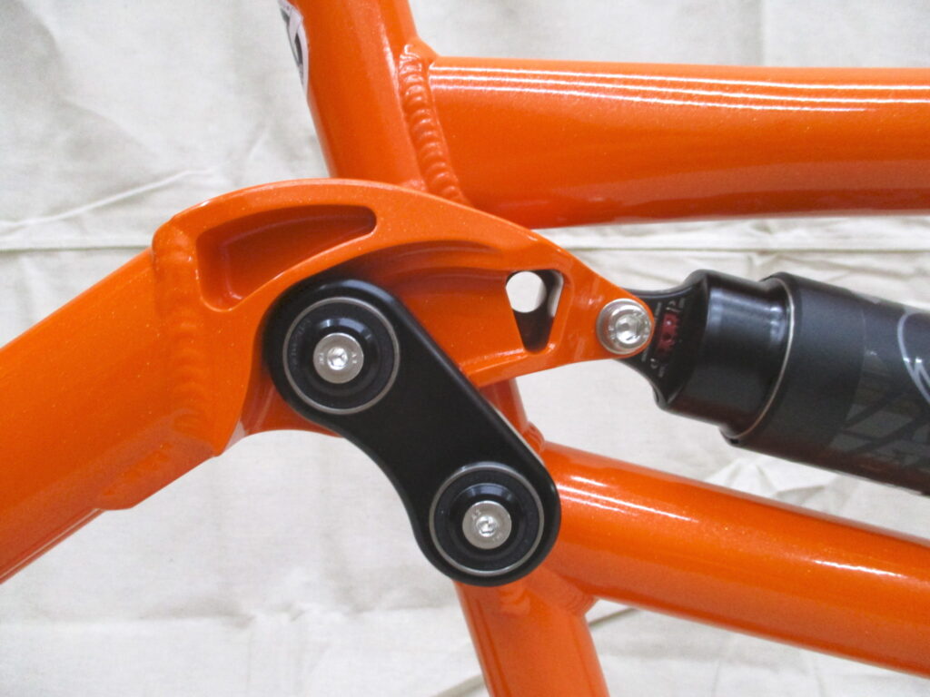 Ventana Grizzly MTB-Tandem. Federungs linkage Farbe Mango Tango